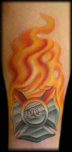 Looking for unique  Tattoos? flaming cross